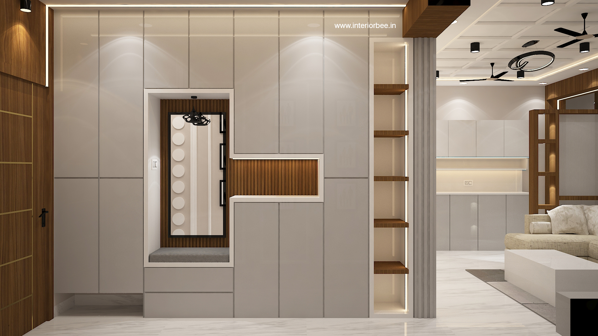Luxury entrance foyer design with custom wall POP moulding, decorative mirror, and modern interior aesthetics designed by Interior Bee in Patna.
